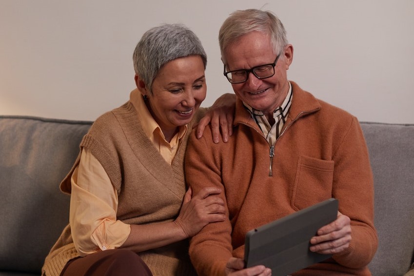 Older couple using a tablet