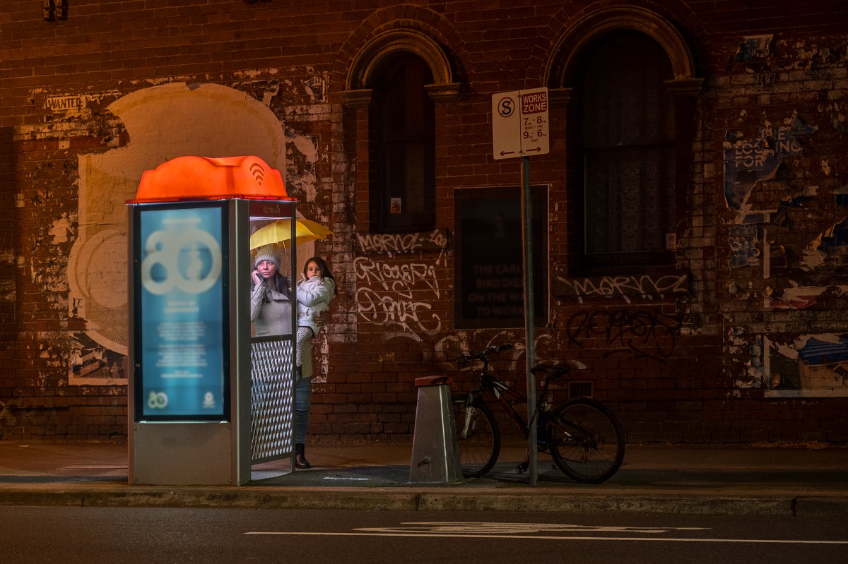 Mother using Telstra phonebooth